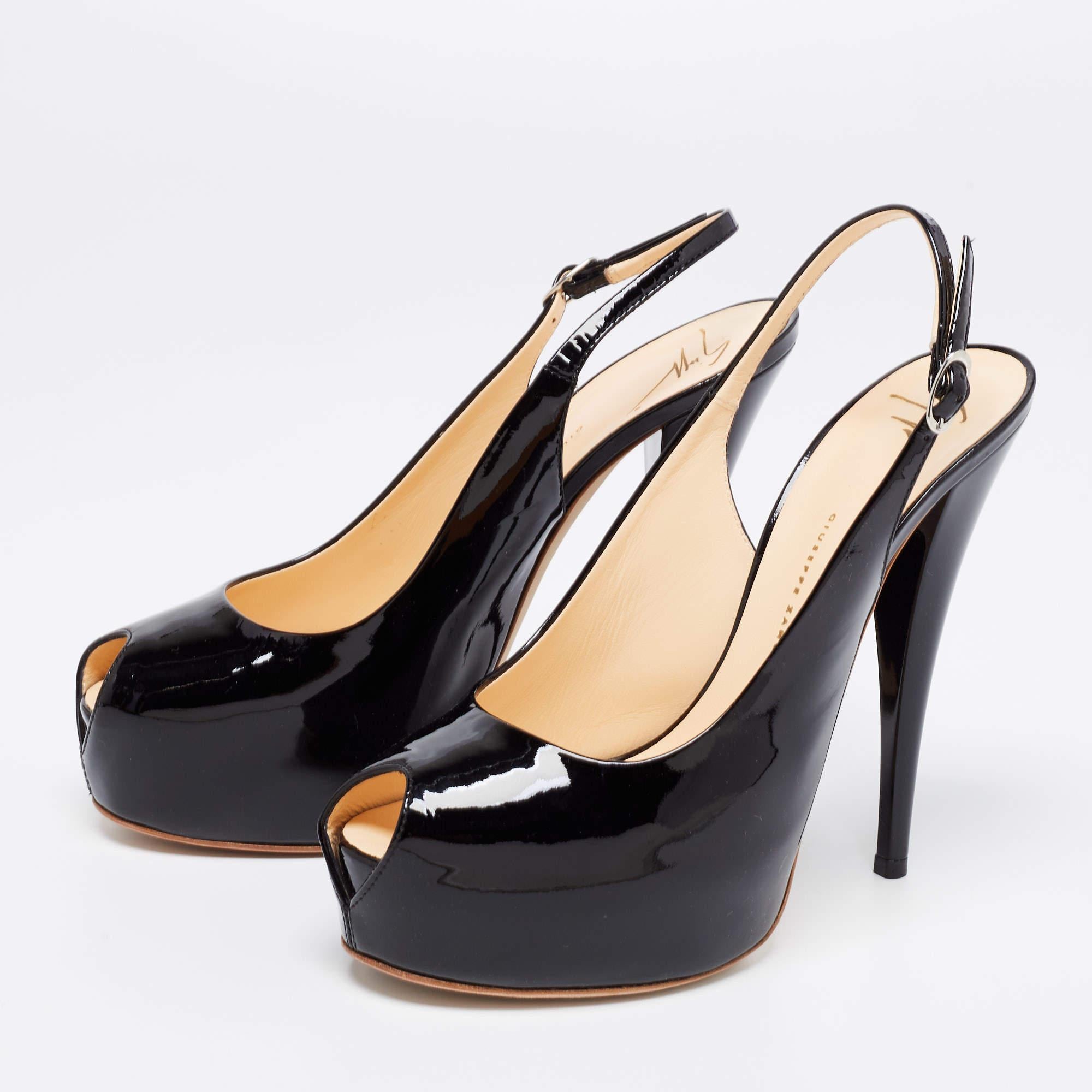 The 14cm heels and platforms of these Giuseppe Zanotti sandals will take your sense of style a notch higher. Constructed from patent leather, the pair is styled with an ankle buckle closure, peep toes, and silver-tone hardware. 
