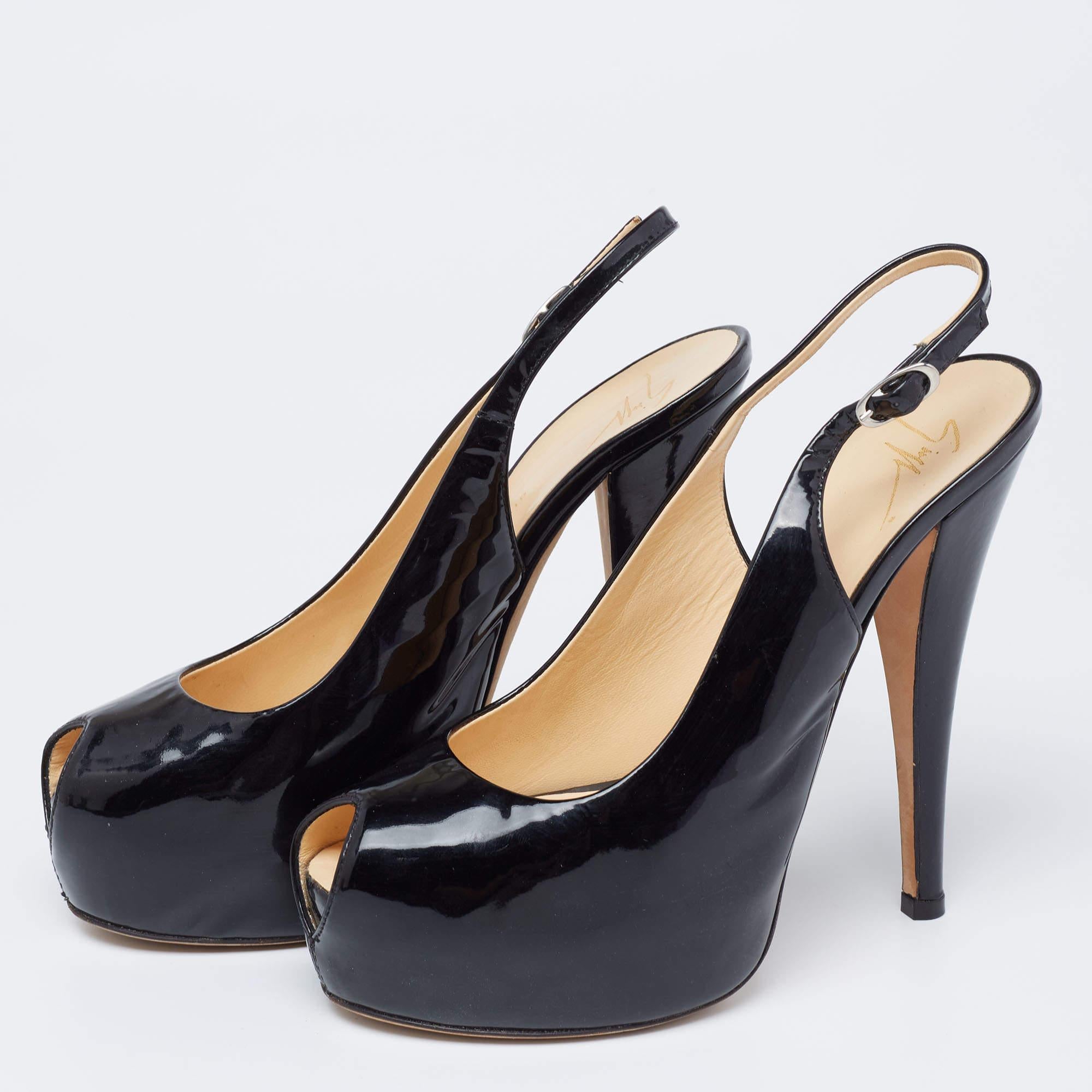 This stunning pair of platform sandals from Giuseppe Zanotti looks even better when worn. They have an elegant design made from patent leather. 14 cm high heels and buckle slingbacks complete the pair and make them ready to be flaunted!