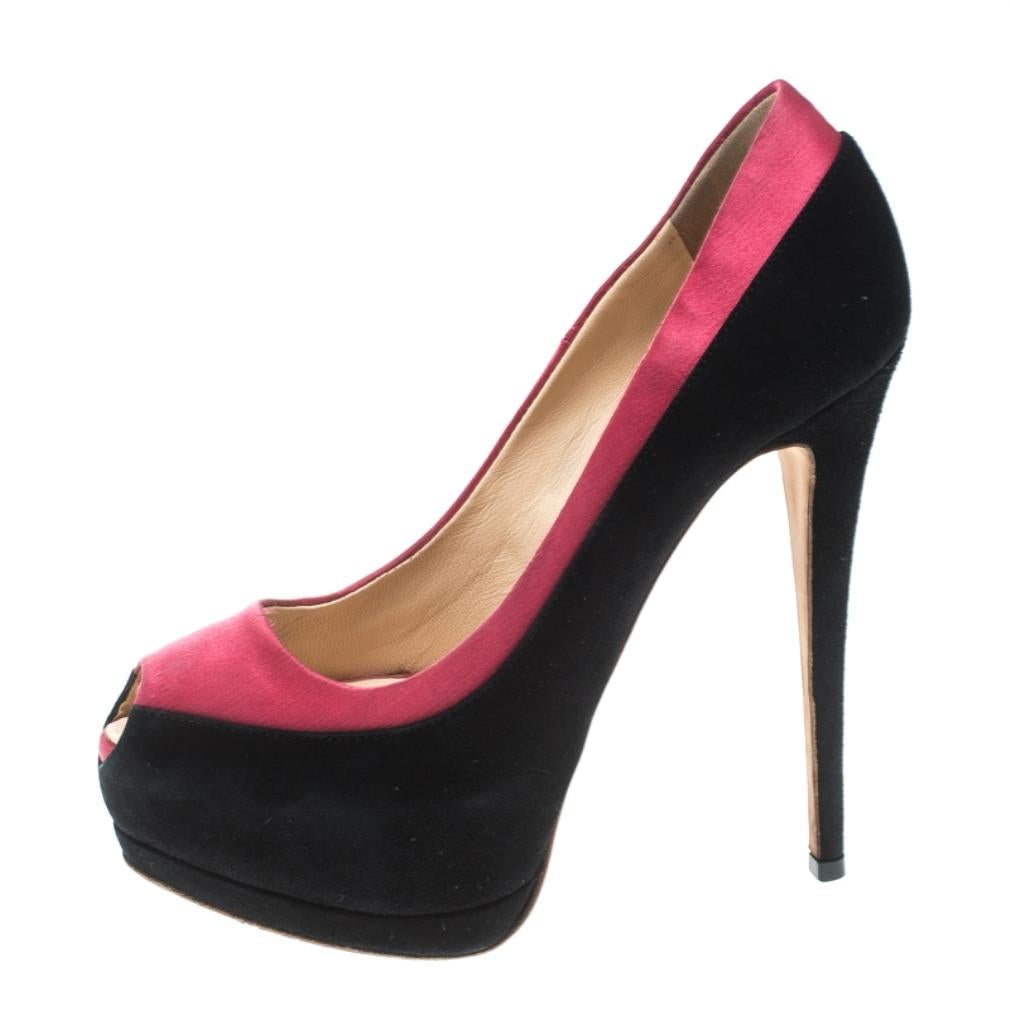 You're all set to touch the skies in these scintillating pumps from Giuseppe Zanotti! The black and pink pumps are crafted from suede and satin and feature a peep-toe silhouette. They come equipped with comfortable leather lined insoles, 14.5 cm