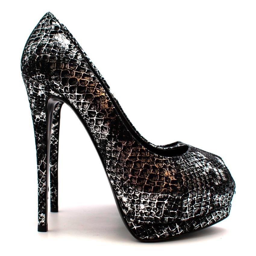 Giuseppe Zanotti Black & Silver Snakeskin Print Peep Toe Platform Pumps

-Gorgeous silver snakeskin pattern on soft suede 
-Soft leather lining 
-Peep toe platform design 
-Neutral hues for easy styling 
-Stiletto heels