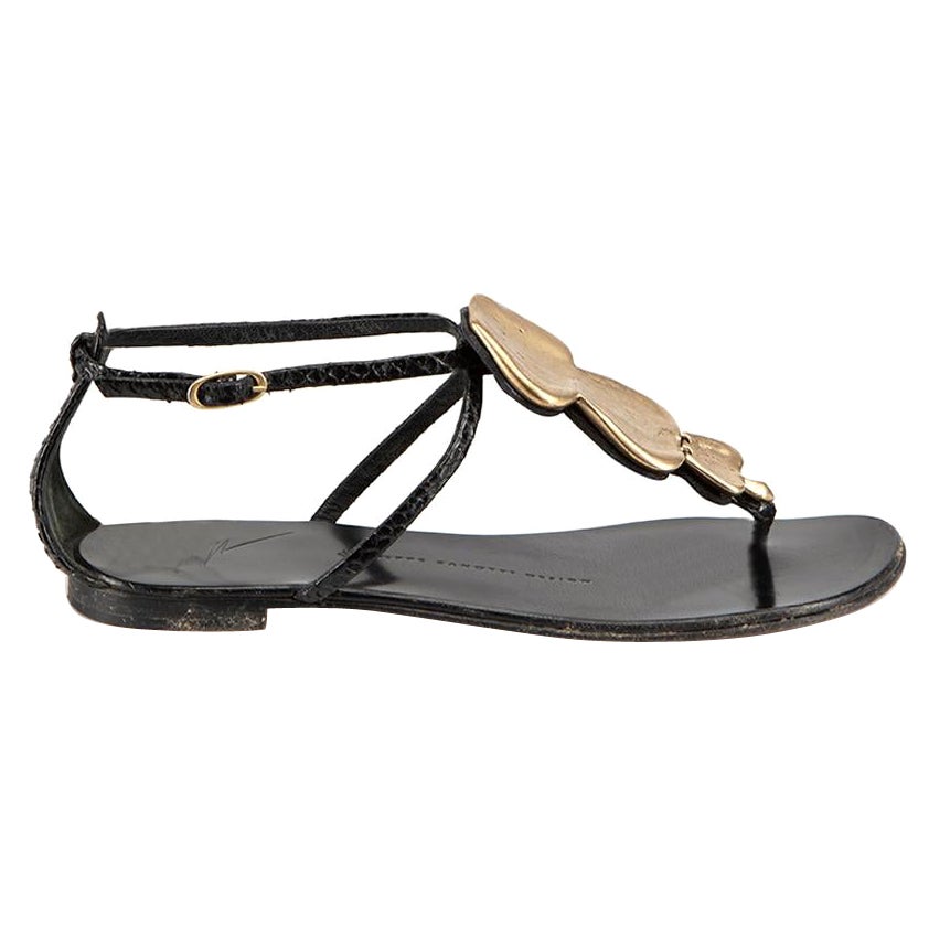 Giuseppe Zanotti Sandalias negras con colgante de piel de serpiente Talla IT 36