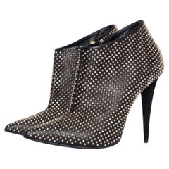 Giuseppe Zanotti, Stivaletti neri con borchie.