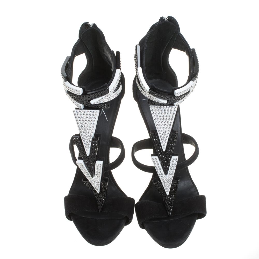 No one crafts sandals as modern and contemporary as Giuseppe Zanotti. Crafted from black-hued suede, this pair is finished with crystal-embellished metal detailing on the uppers. They come equipped with zip fastenings, 12 cm heels and comfortable