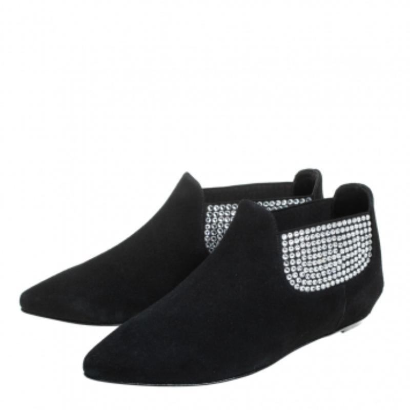 These flat booties from Giuseppe Zanotti spell everything chic and modern! They are crafted from black suede and adorned exquisitely with dazzling crystal embellishments. They feature pointed toes and come endowed with comfortable leather-lined