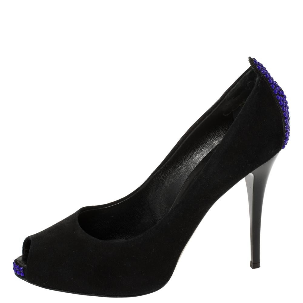 An exclusively designed pair for you to help you make a statement! These Giuseppe Zanotti pumps are crafted from black suede and styled with peep-toes. They are decorated with crystal embellishments on the toe tips and the counters and come equipped