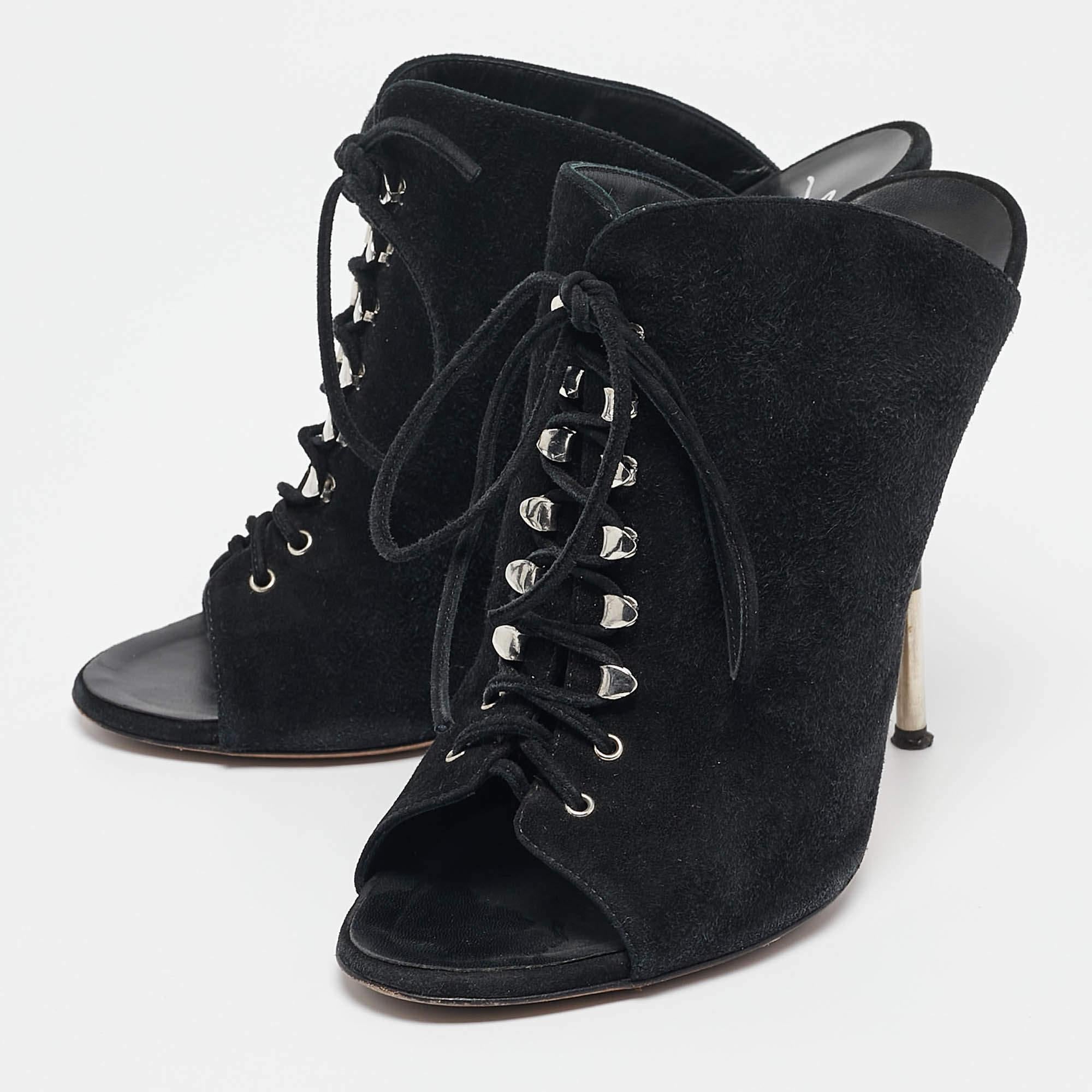 The ease of slipping into your shoes as you head out and taking them off once youre home is elevated with mules. These Giuseppe Zanotti mules for women bring the same comfort  with a lot of style.