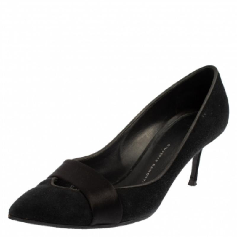 A beautifully constructed pair by Giuseppe Zanotti to give you a luxurious feel. The pumps are designed in a pointed-toe style with strap details on the vamps and lifted on 7 cm heels. The classy black color amplifies the pair's appeal.