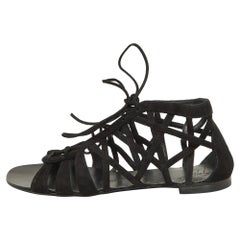 Giuseppe Zanotti Sandalias planas con cordones y tiras de ante negro talla 38