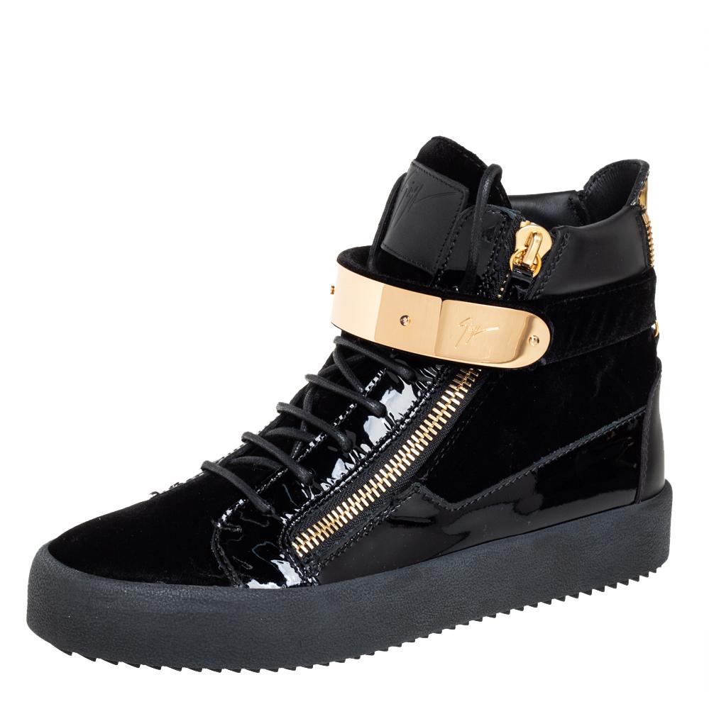 Bring home the luxurious high-fashion touch with these sneakers from Giuseppe Zanotti. Crafted from patent leather and velvet, these sneakers come with statement details like the velcro strap, the lace-up, and dual zippers. You wouldn't want to miss
