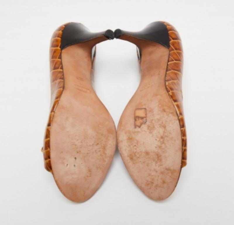 Giuseppe Zanotti Bombas con puntera abierta de piel de cocodrilo marrón talla 39,5 Marrón en venta