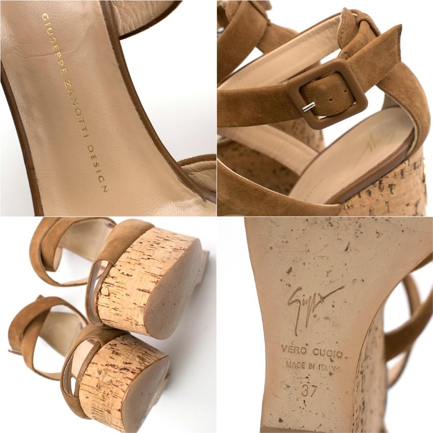 Giuseppe Zanotti Brown Platform Wedge Sandals

-Gold tone logo on back of heel
-Wrap ankle and buckle closure
-Open toe front
-Light beige leather sole

Materials
Upper - leather suede
Sole - cork
Hardware - silver tone covered in leather

Made in
