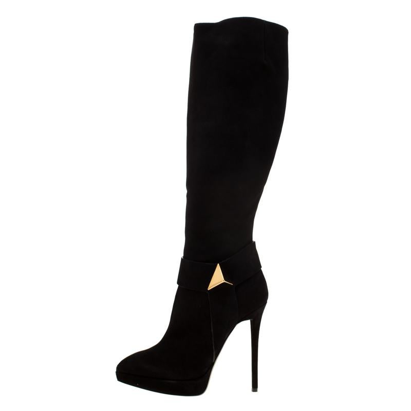Simply splendid are these knee boots from Giuseppe Zanotti! Crafted from suede and styled to a knee-length, these boots are on-point with style. They come with platforms, pointed toes, 13 cm heels and pyramid studs on the sides. These boots are just