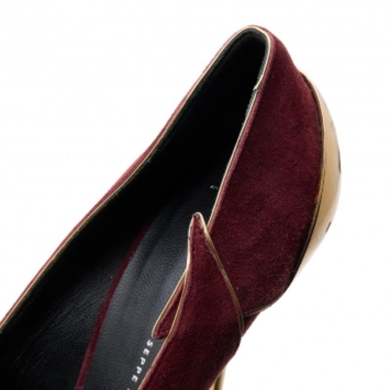 There are some shoes that stand the test of time and fashion cycles, these timeless Giuseppe Zanotti pumps are the one. Crafted from suede in a burgundy shade, they are designed with sleek cuts, almond-toes, and tall heels.