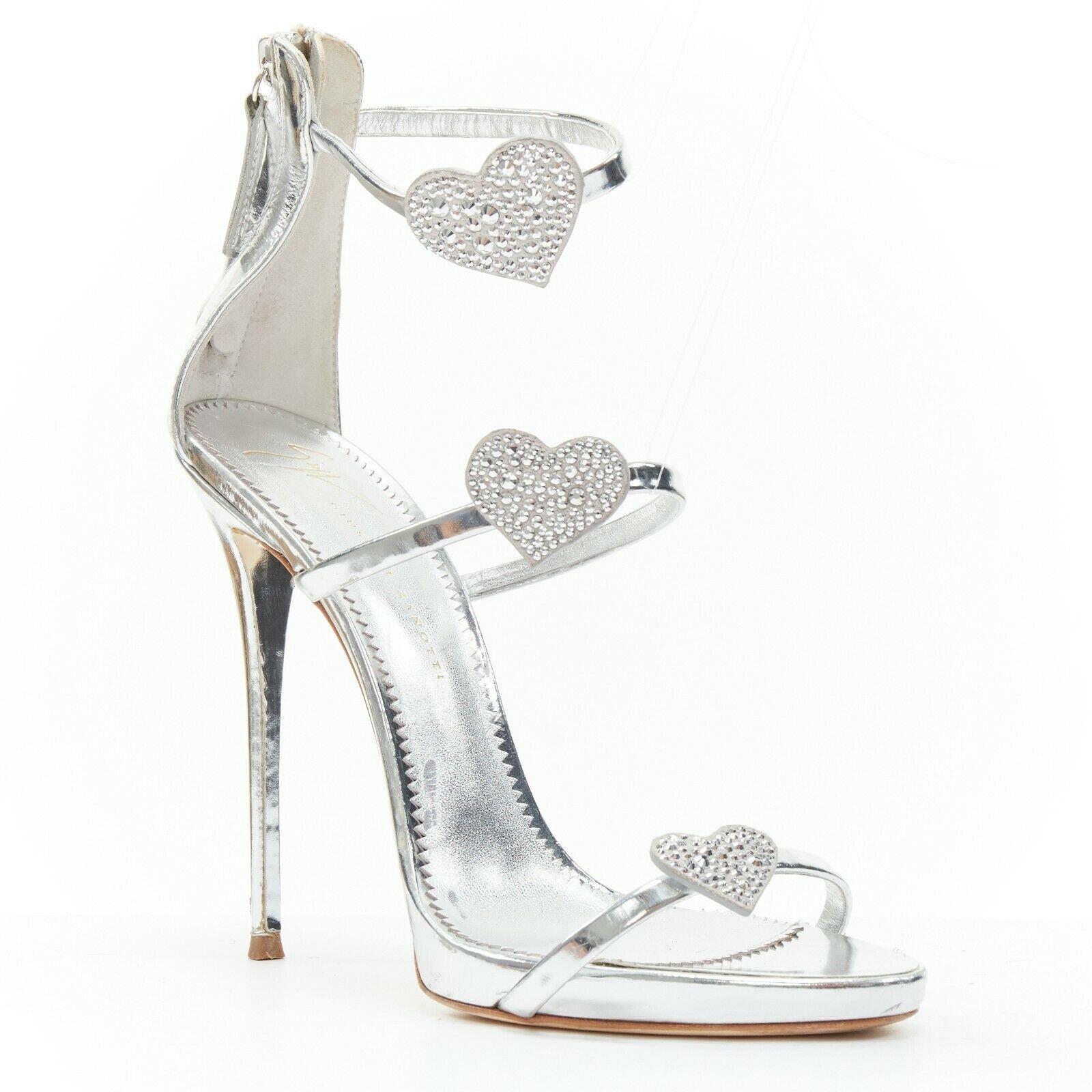 GIUSEPPE ZANOTTI Coline silver leather crystal heart high heel sandals EU39 
Reference: TGAS/A03175 
Brand: Giuseppe Zanotti 
Designer: Giuseppe Zanotti 
Model: Giuseppe Zanotti Coline 
Material: Leather 
Color: Silver 
Pattern: Solid 
Closure: Zip