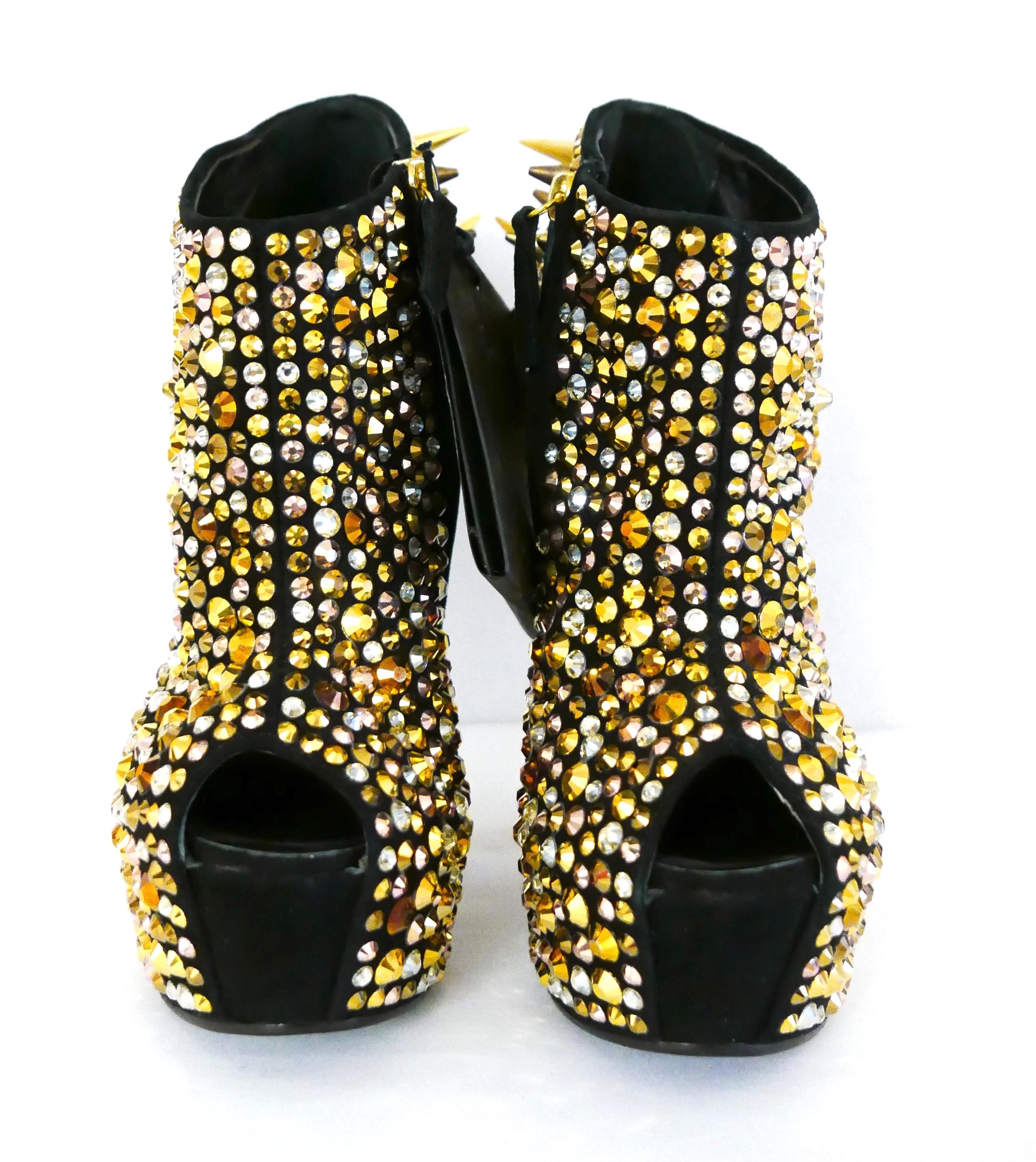 Work of art Giuseppe Zanotti maxi wedge bootie with crystal and spike detail. Bought for $2950 and unworn with spare spikes/tag. 
Meticulously crafted in black suede with heavy crystal, stud and spike embellishments. They have a towering yet sturdy