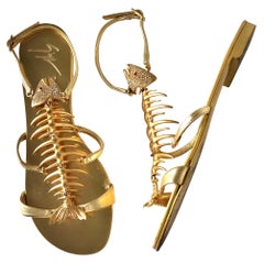 Giuseppe Zanotti Sandalias planas doradas con cristales de piraña 37
