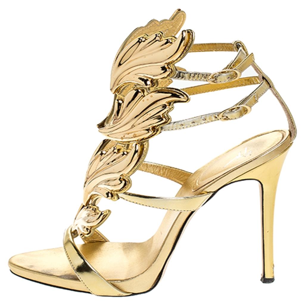 This impressive pair of sandals by Giuseppe Zanotti can give your entire ensemble a makeover. Crafted in Italy, they are made of quality leather and metal. They come in a stunning shade of gold and have an open-toe silhouette. They feature a baroque