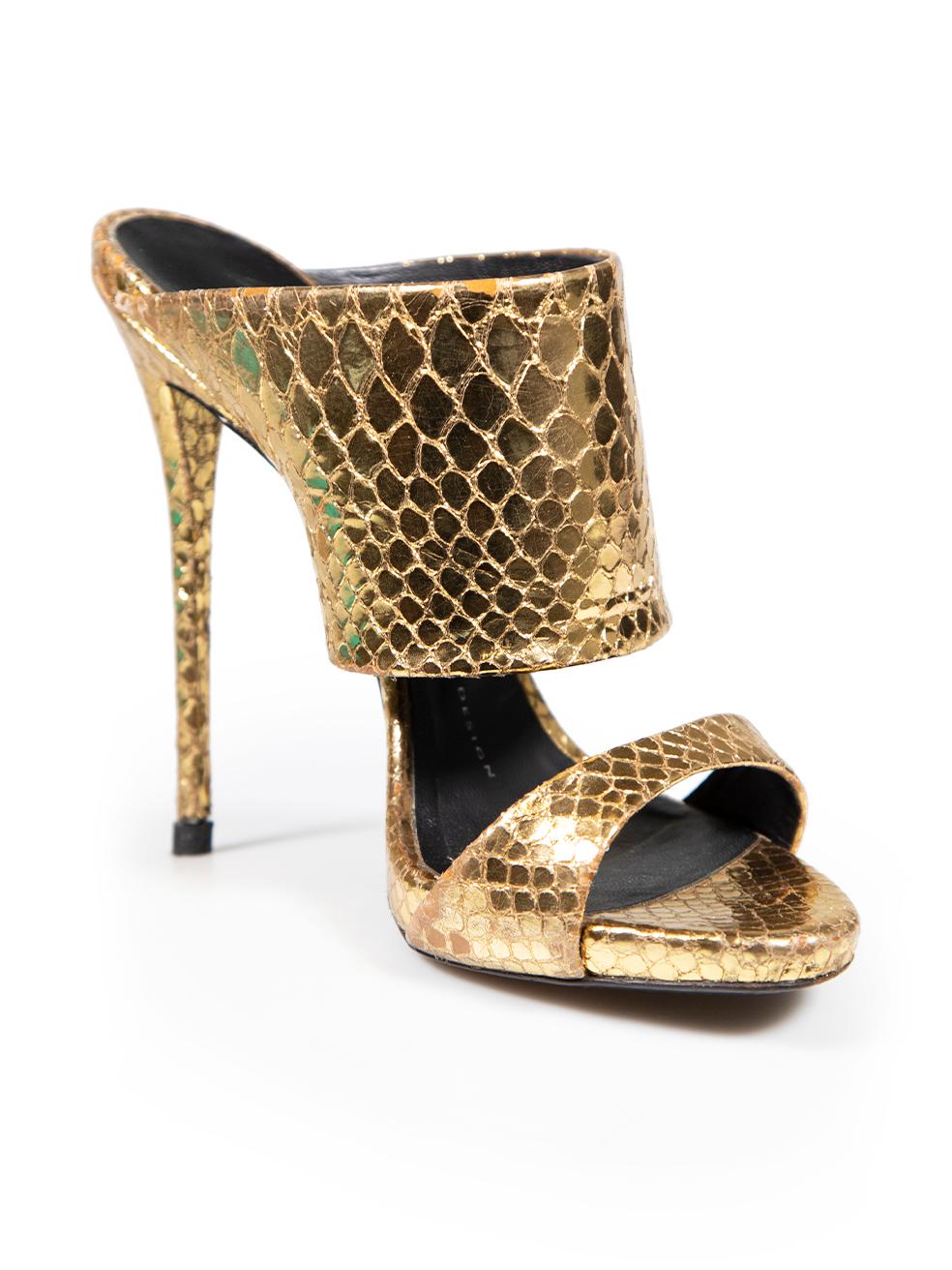 CONDITION is Good. General wear to shoes is evident. Moderate signs of wear to both shoe heels, toes and both sides with peeling of the snakeskin scales on this used Giuseppe Zanotti designer resale item.
 
 
 
 Details
 
 
 Gold metallic
 
