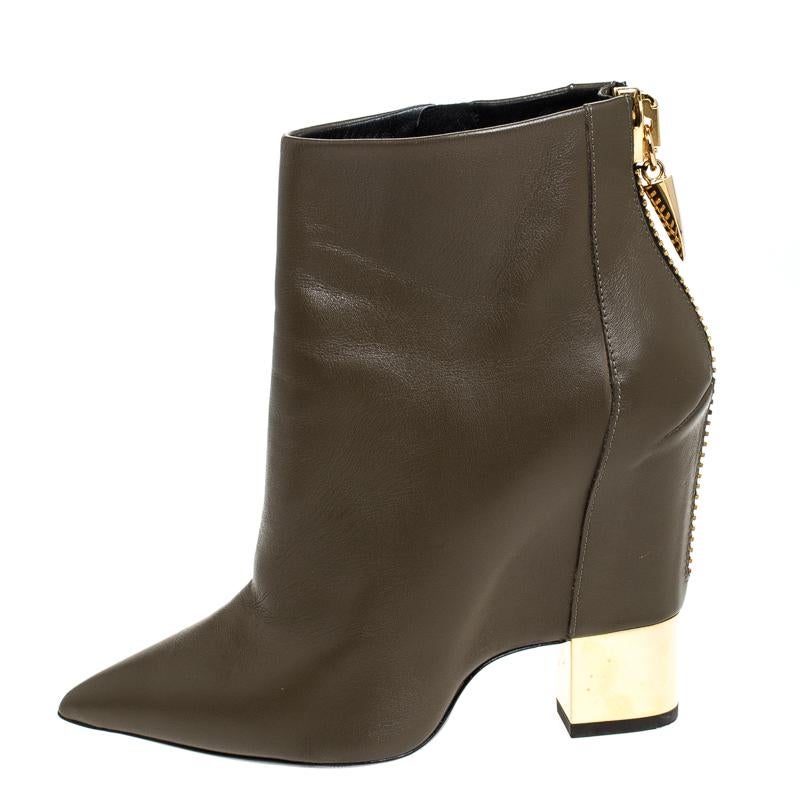 Any lover of luxury will agree that Giuseppe Zanotti's designs are not only high on style but also comes from excellent workmanship, just like these ankle boots. Covered in leather and shaped wonderfully, these simple ankle boots have pointed toes