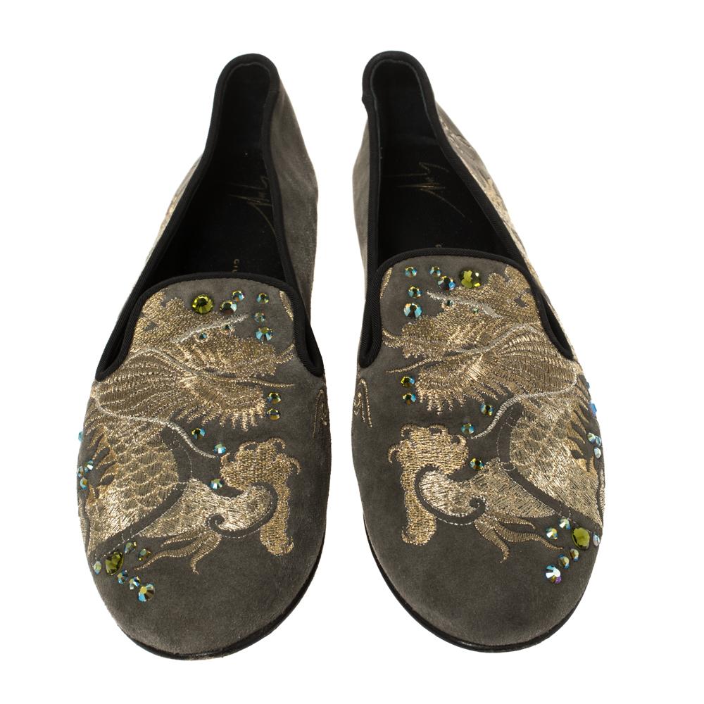 These slip-on loafers from the house of Giuseppe Zanotti exhibit an appealing design. They feature round toes, embellishment on the suede exterior, and comfortable insoles for all-day ease. They are finished with leather soles for lasting