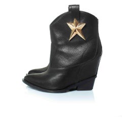 Giuseppe Zanotti, hidden platform wedge star boots
