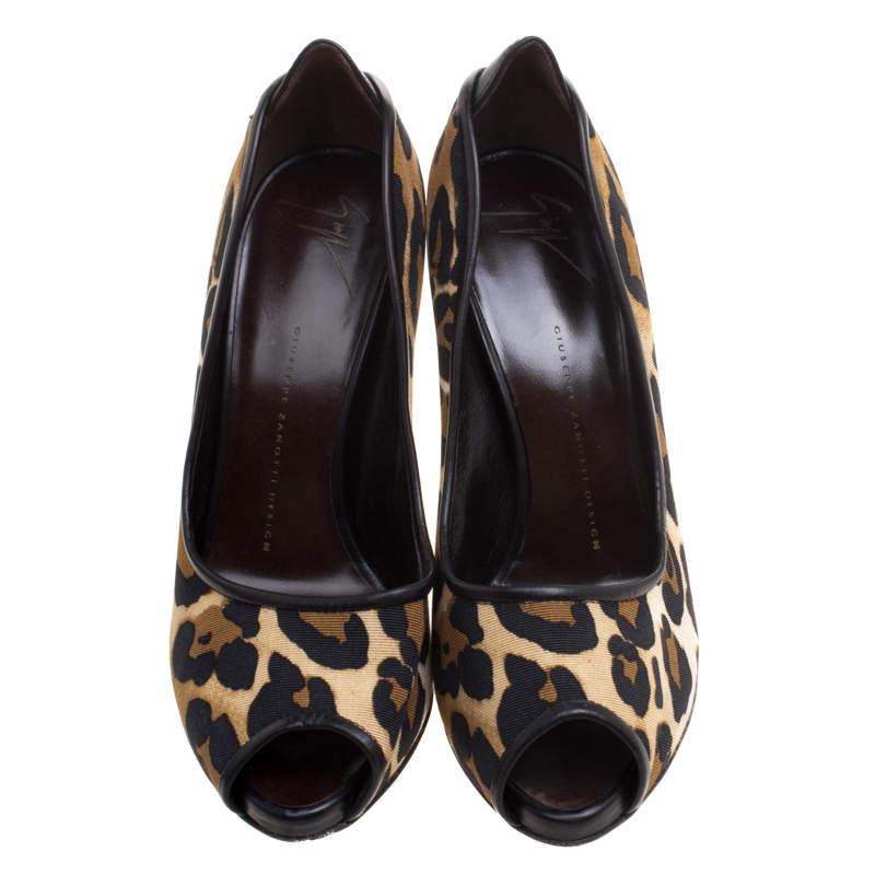 This chic pair of pumps is by Giuseppe Zanotti. Crafted from leopard print canvas, they feature a peep toe style and stiletto heels. A twist to the classic pumps this pair is a wardrobe must have.

Includes: Original Dustbag

