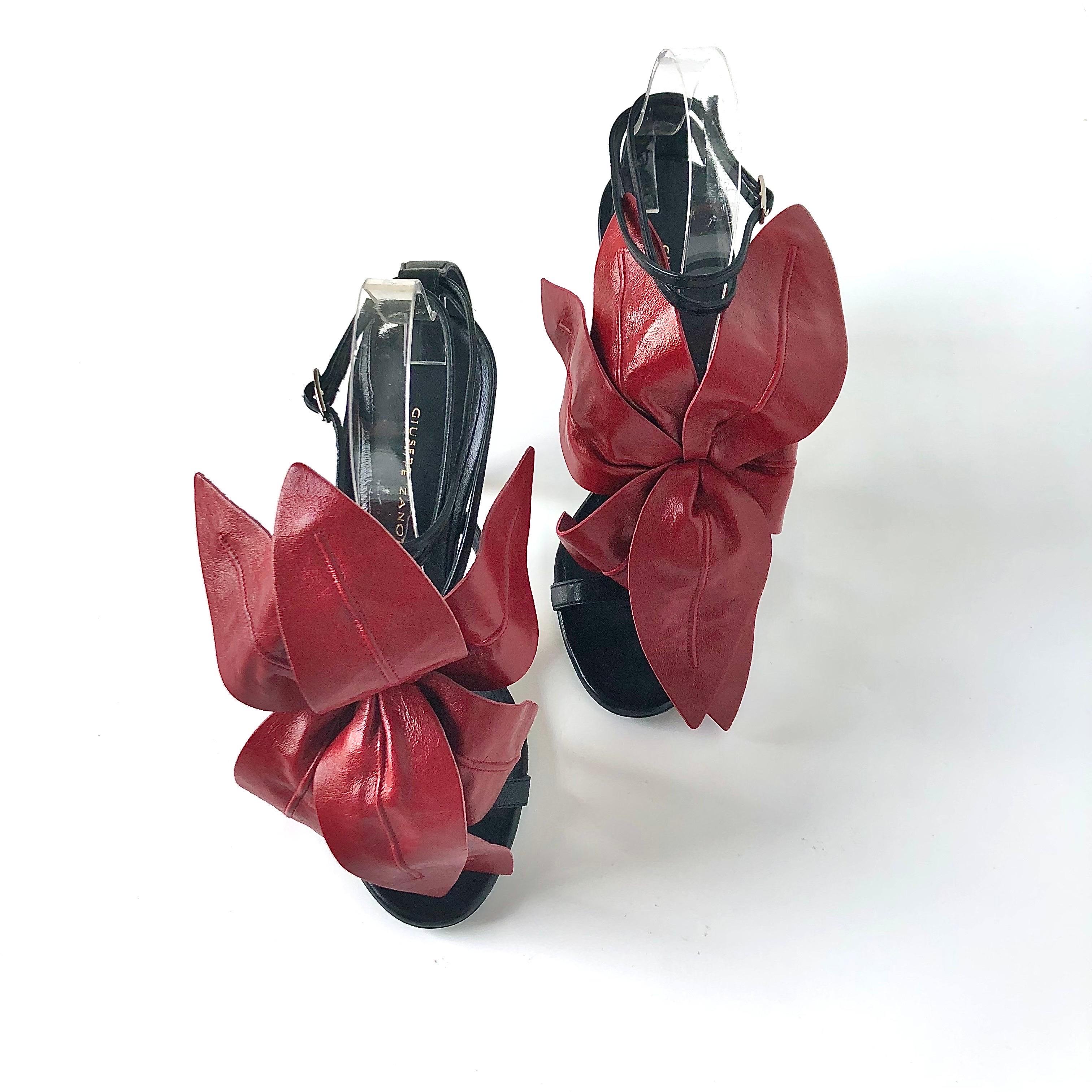 Giuseppe Zanotti Sandalias de tacón alto con adornos florales y tiras 37 Marrón en venta