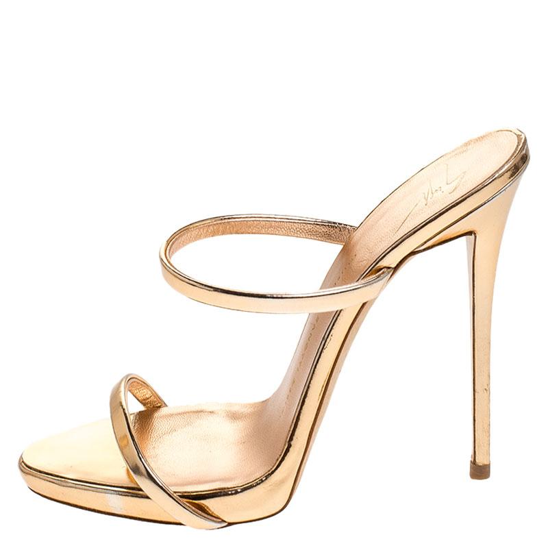 Designed purposely for fashion queens like you, these Giuseppe Zanotti slides are soul-crushingly gorgeous! From their shape to their metallic rose gold leather body, these slides will bring you the best experience. They feature dual straps, leather