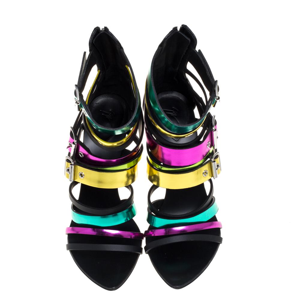 These fabulous multicolor sandals are from the iconic house of Giuseppe Zanotti. Crafted in Italy, they exhibit a cage design and come crafted from leather and styled with open toes, multiple buckle fastenings, zippers on the counters, and 12 cm