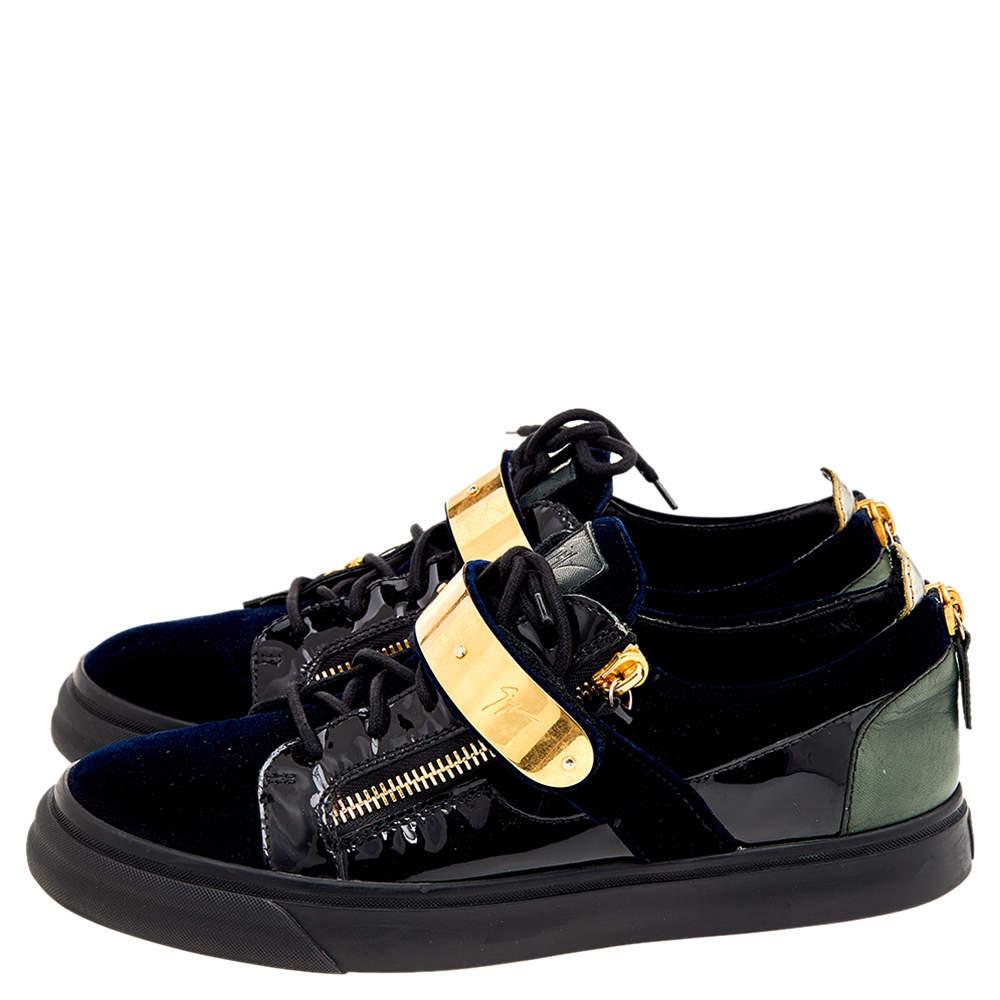 Holen Sie sich mit diesen Sneakers von Giuseppe Zanotti einen luxuriösen Hauch von High Fashion nach Hause. Die aus hochwertigen Materialien gefertigten Sneaker bestechen durch raffinierte Details wie die Klettverschlussriemen, die Schnürung und den