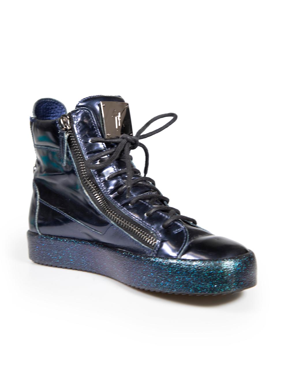 CONDITION is Very good. Minimal wear to trainers is evident. Abrasions and scratches to the patent leather on this used Giuseppe Zanotti designer resale item.
 
 
 
 Details
 
 
 Navy
 
 Patent leather
 
 High top trainers
 
 Round toe
 
 Flatform