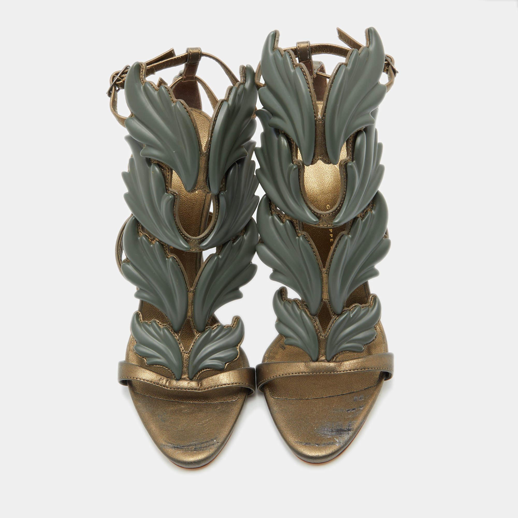 Giuseppe Zanott's Cruel Summer sandals are all about making a statement with your fashion. These in olive green are made using leather, and they feature the signature wings on the front.

