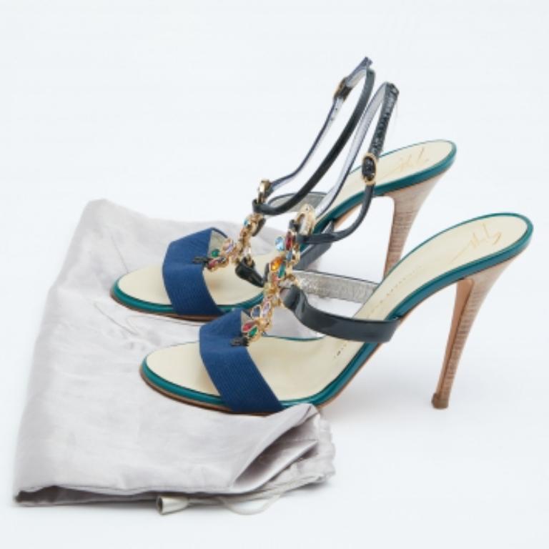 There's nothing that we don't love about these Giuseppe Zanotti sandals! They're impressive with their multicolored construction and crystal-embellished front straps. They come equipped with comfortable leather-lined insoles and stand tall on 11 cm