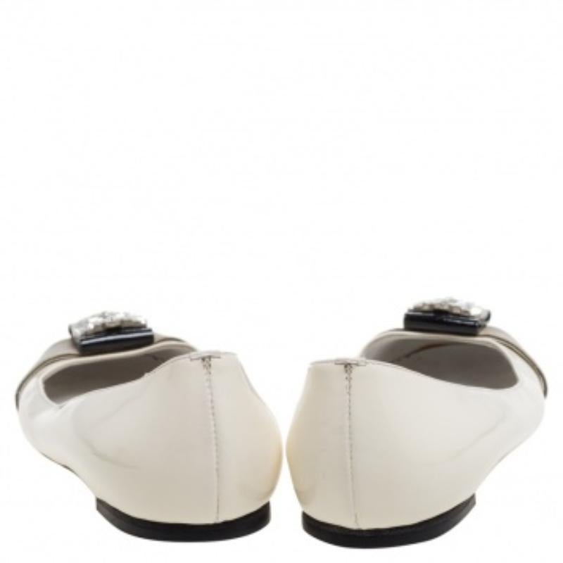 Ballet flats never looked so stunning, thanks to these ones from Giuseppe Zanotti. The patent leather construction is complemented with striped fabric and crystal-embellished vamps and the flats come endowed with comfortable leather-lined insoles.