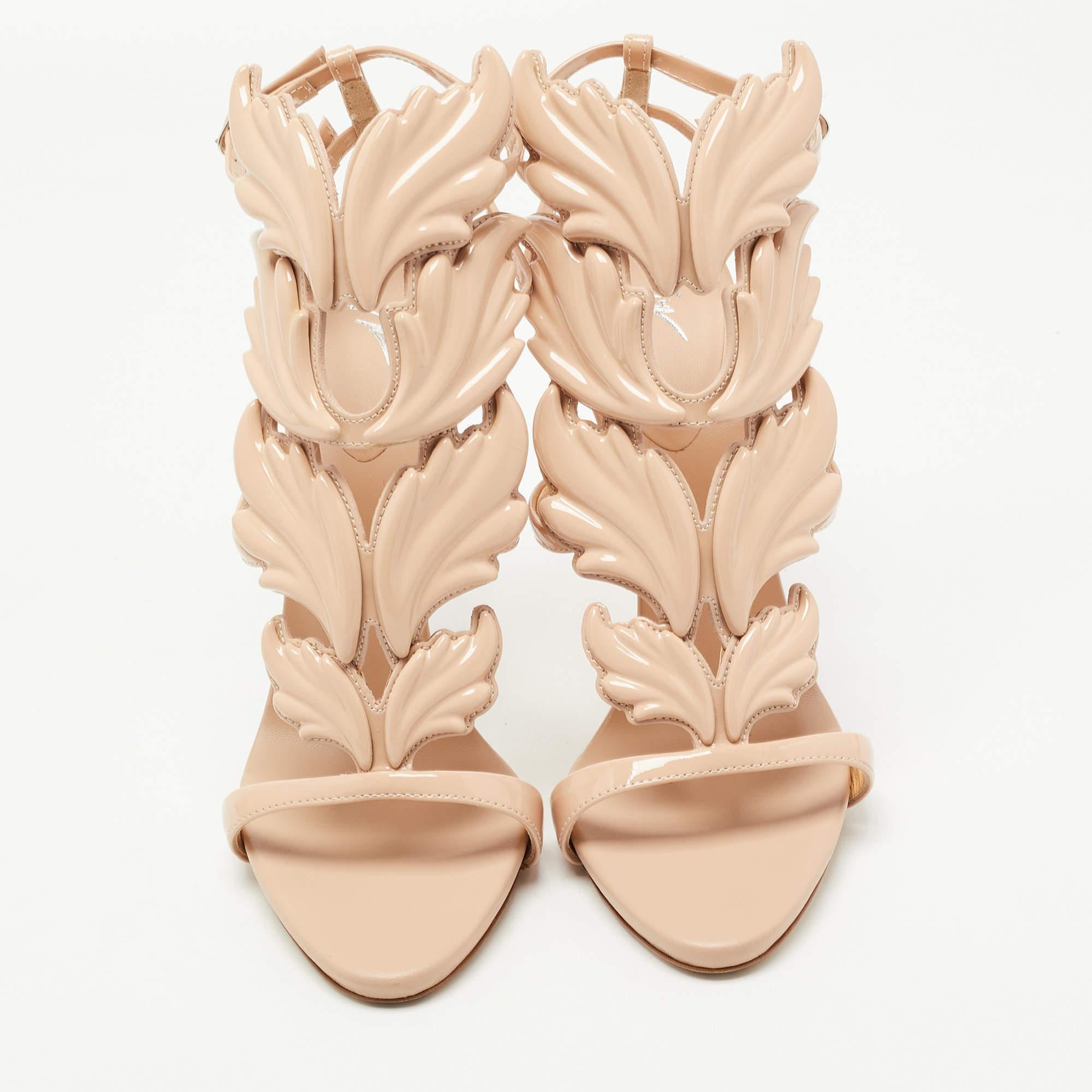 Giuseppe Zanott's Cruel sandals are all about making a statement with your fashion. These in peach are made using patent leather, and they feature the signature wings on the front.

Includes: Original Dustbag, Original Box

