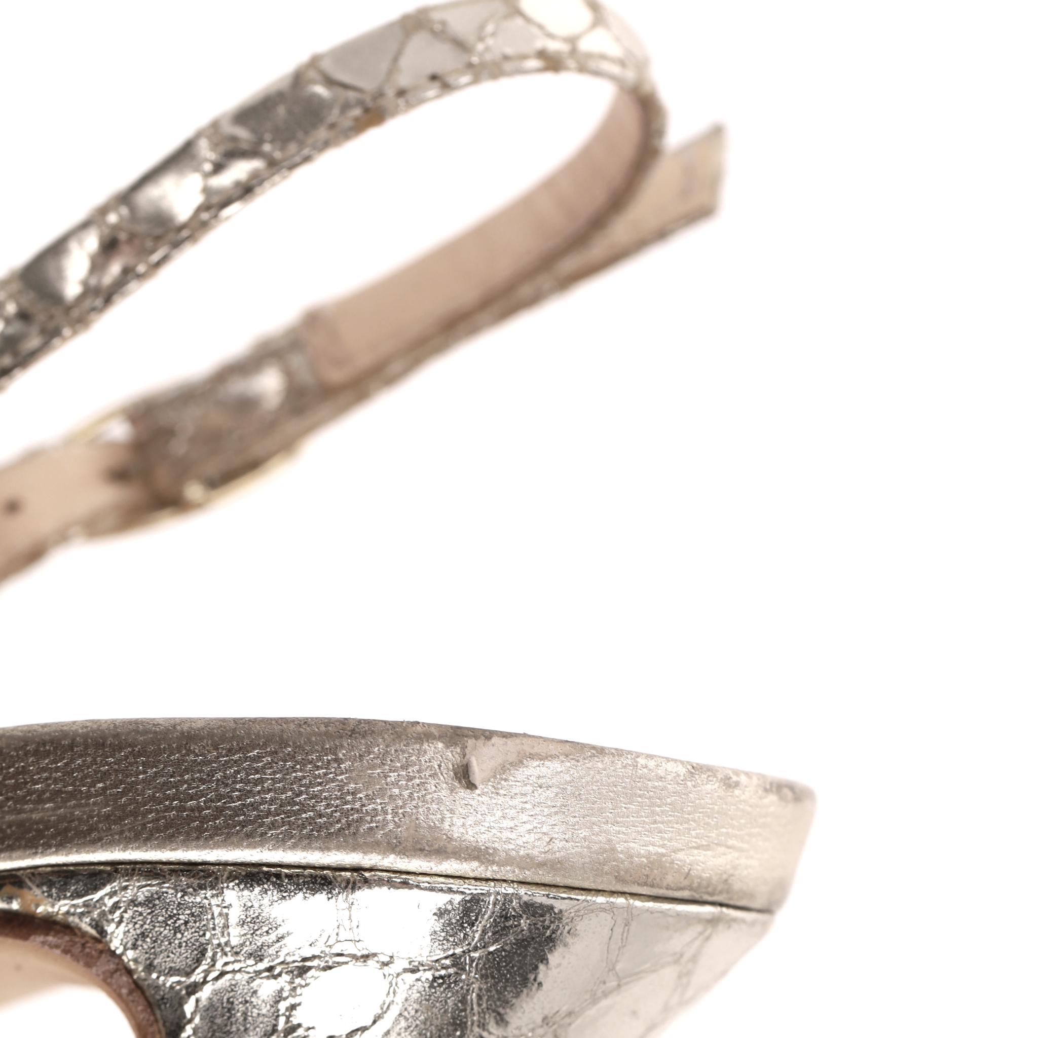 Zapatos de tacón Giuseppe Zanotti con punta y plataforma de piel de serpiente en venta 1