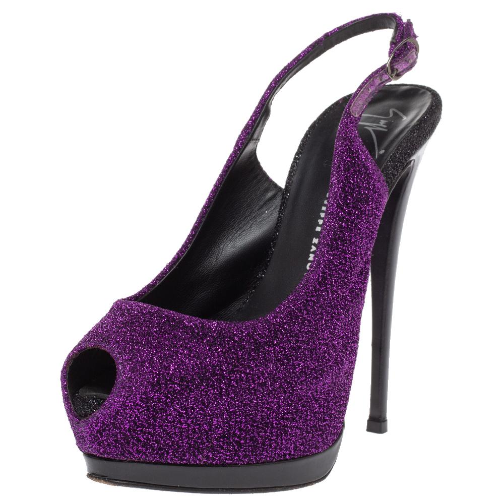 Those stylish outfits will look a lot more appealing with these bold purple sandals from Giuseppe Zanotti. They have been crafted from glitter lurex fabric and patent leather into a peep-toe silhouette and styled with slingbacks. They are made