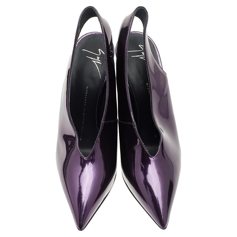 A feminine flair, sleek cuts, and a timeless appeal characterize these stunning Giuseppe Zanotti pumps. Crafted from patent leather in a purple shade, the pointed-toes and slingbacks complete these beauties. Style them with short dresses to