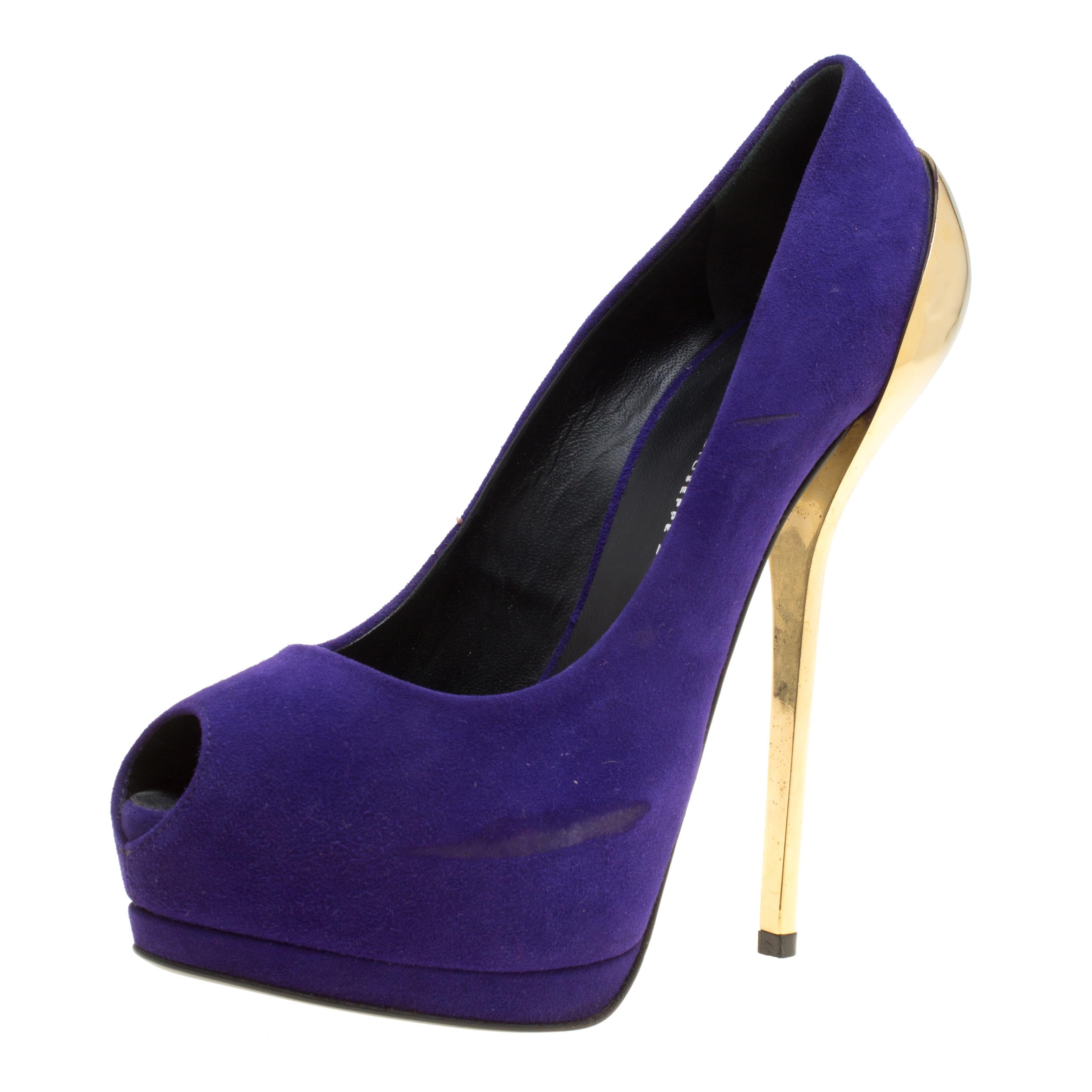 Revamp your footwear collection by adding this pair of Giuseppe Zanotti pumps to it. They are crafted from purple suede and designed with peep toes, platforms and 16.5 cm metal heels that fall from the counters.

Includes: The Luxury Closet