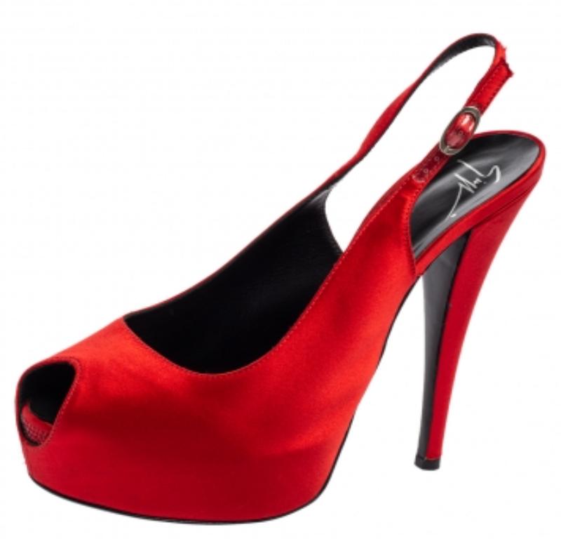 Feel your glamorous best by donning these Giuseppe Zanotti pumps that are high on luxury and style. They've been made using red satin and flaunt a peep-toe design. The slingbacks are finished with towering 15 cm heels and smooth leather insoles.