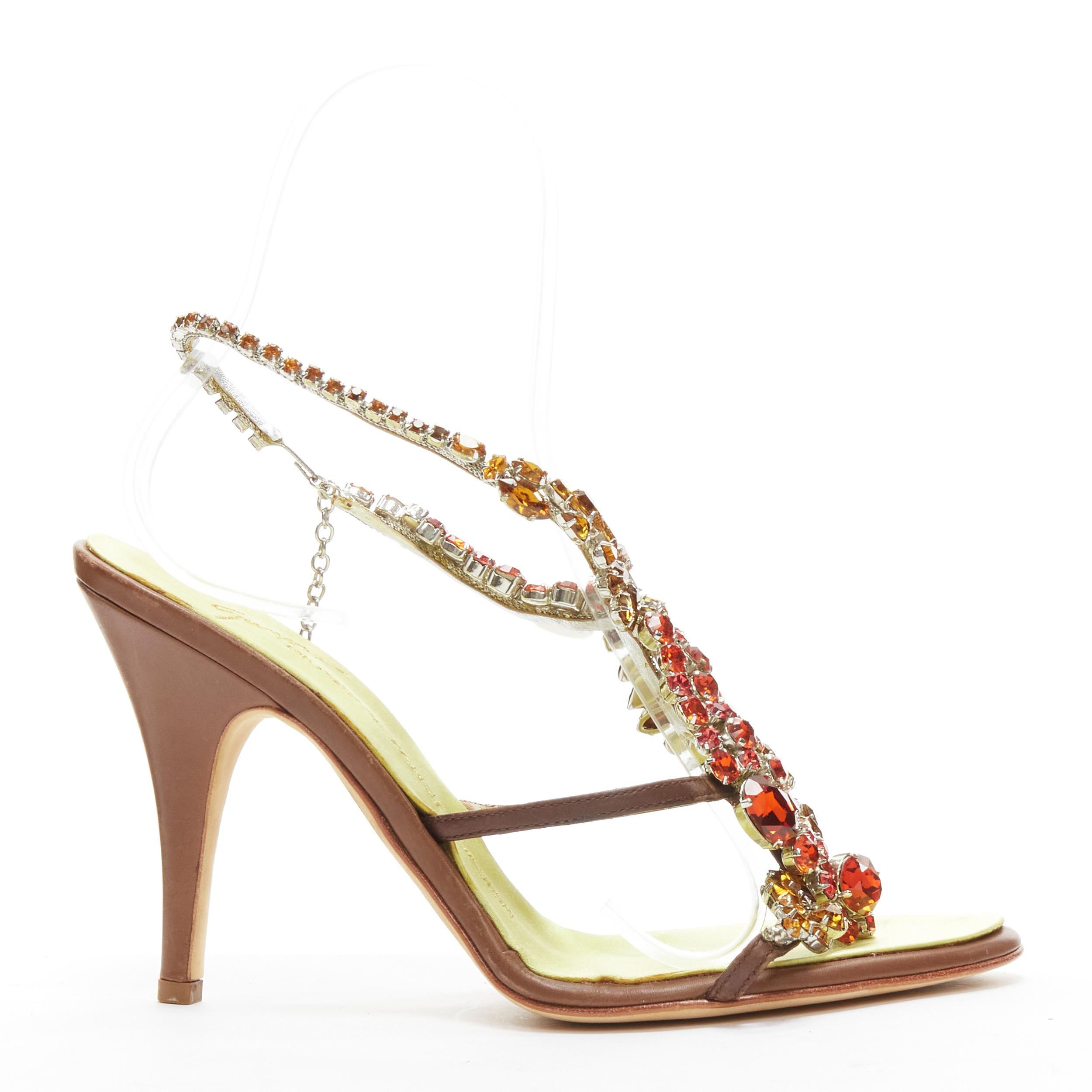 GIUSEPPE ZANOTTI red yellow rhinestone embellished brown leather sandals EU38
Reference: GIYG/A00273
Brand: Giuseppe Zanotti
Material: Leather
Color: Red, Yellow
Pattern: Solid
Closure: Hook & Bar
Lining: Satin
Extra Details: Hook and chain closure