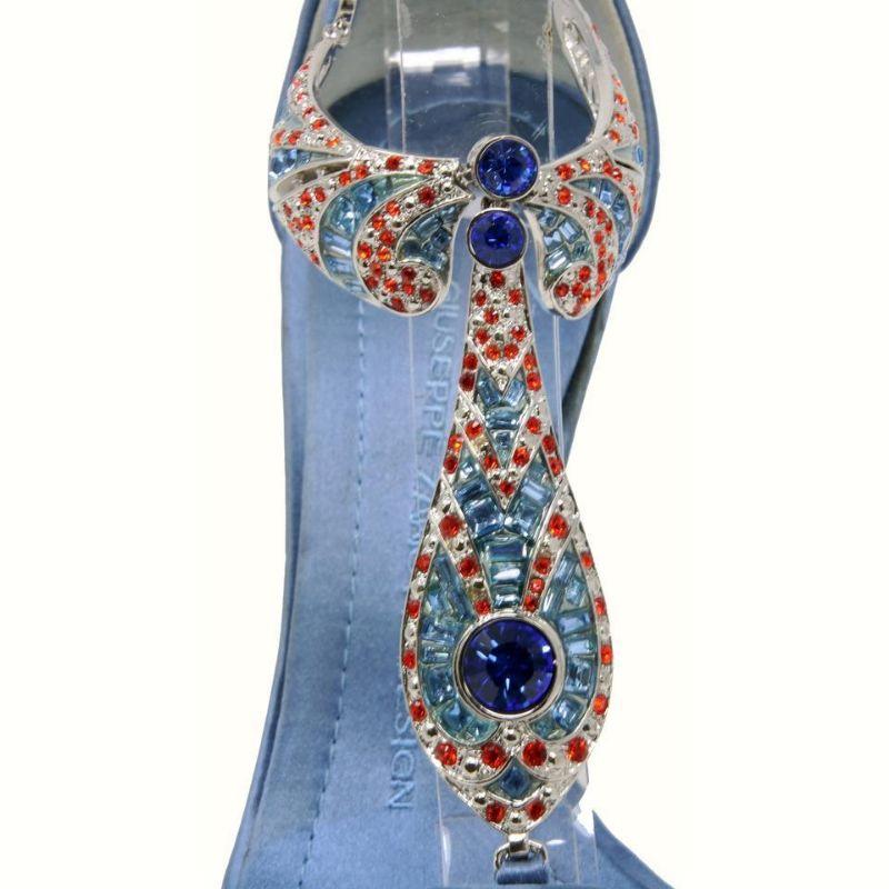 Giuseppe Zanotti Satin Crystallized Leather Sandal Heels 37.5 GZ-S0917P-0153

These gorgeous Giuseppe Zanotti Blue Satin Crystal Strappy Heel Pumps feature straps with crystal drape beading. The perfect heels for a special occasion or your upcoming