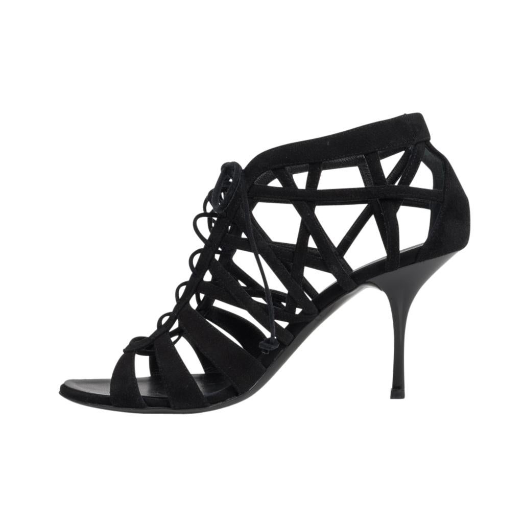 Giuseppe Zanotti fabulous black suede cage shoe.
Open toe lace up shoe.
Heel is black patent.
final sale

SIZE 39
USA SIZE 9

SHOE MEASURES:
INNER (UPPER) SOLE 9.75