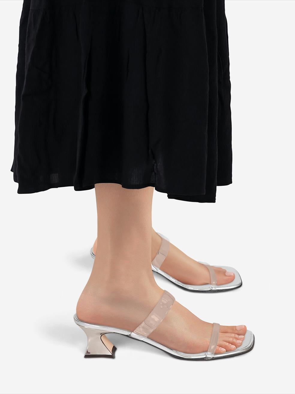 CONDITION is New with tags on this brand new Giuseppe Zanotti designer item. This item comes with original packaging.
 
 
 
 Details
 
 
 E300019002
 
 Silver
 
 PVC
 
 Sandals
 
 Transparent straps
 
 Mid heel
 
 
 
 
 
 Made in Italy
 
 
 
