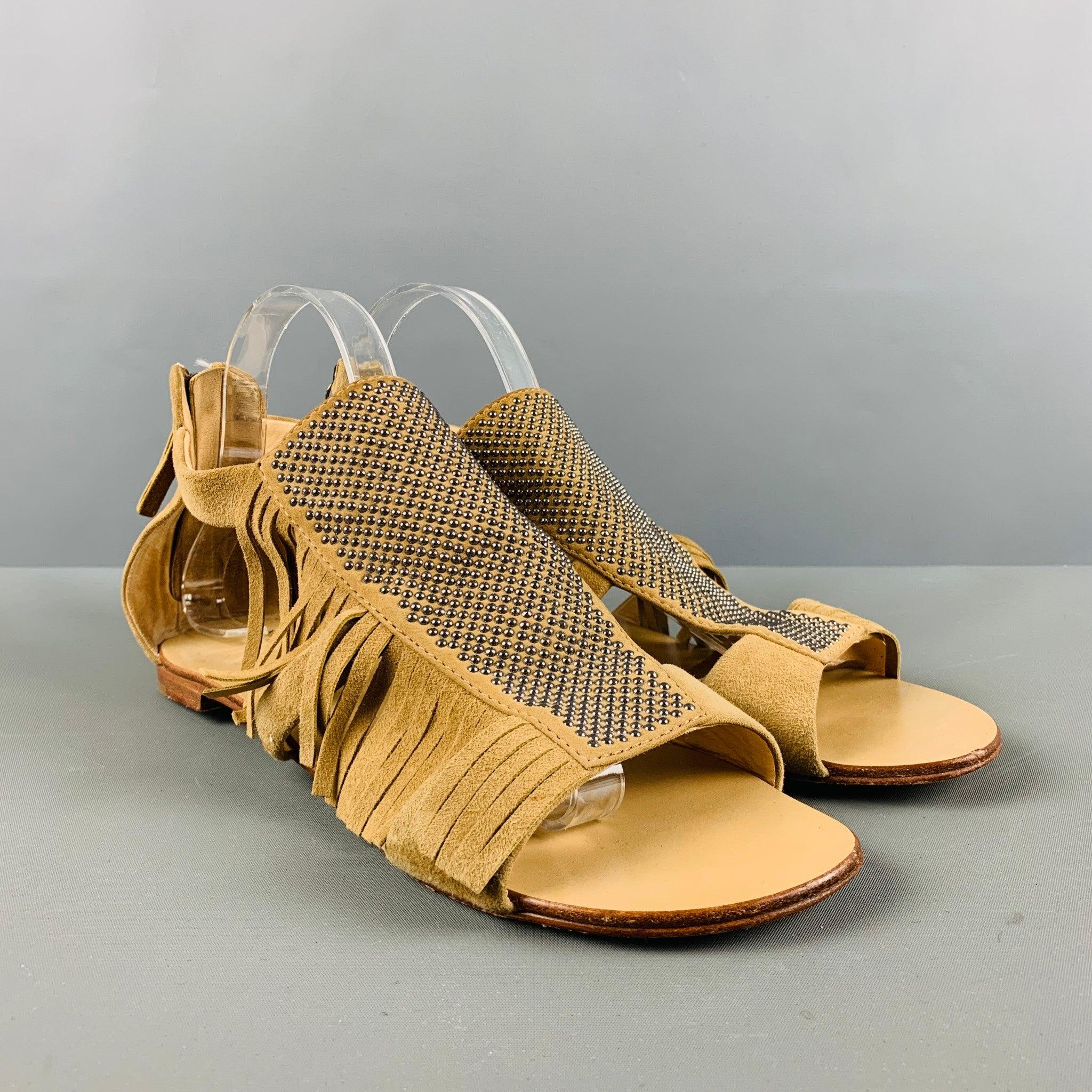 GIUSEPPE ZANOTTI sandals comes in a beige suede featuring a fringed design, silver studded detail, and a zip up ankle style. Very Good Pre-Owned Condition. 

Marked:   40Outsole: 10.5 inches  x 3.25 inches  
  
  
 
Reference No.: 128325
Category:
