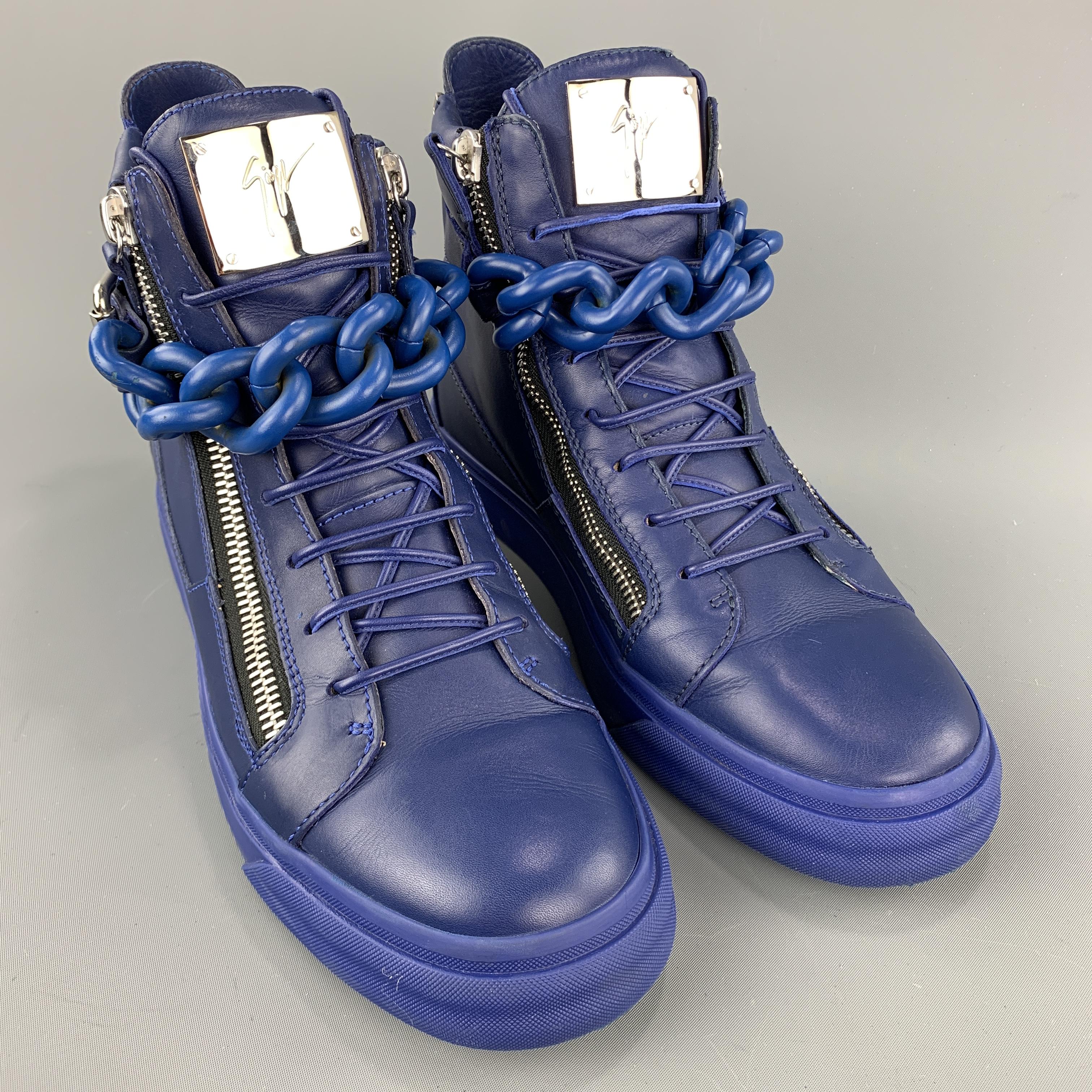 GIUSEPPE ZANOTTI sneakers comes in a blue leather featuring a high top style, zipper details, chunky chain, and a rubber sole. Made in Italy. Comes with box.
 

Very Good Pre-Owned Condition.
Marked: 43

Outsole: 4 in. x 12 in. 