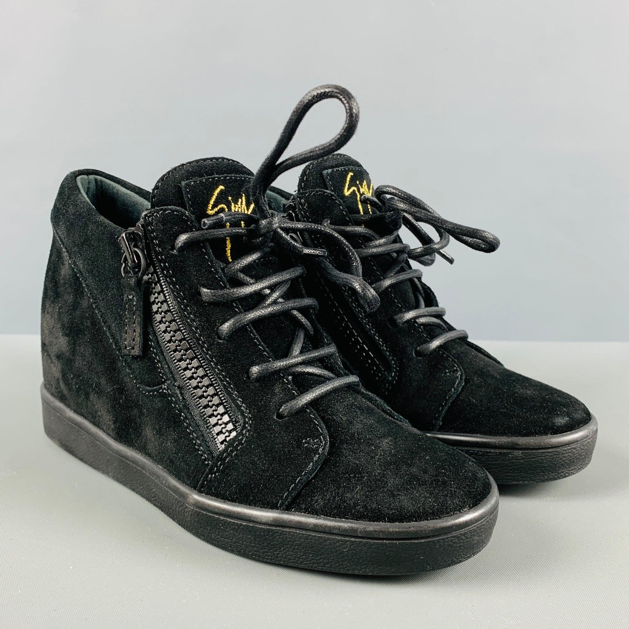 GIUSEPPE ZANOTTI sneakers comes in a black suede featuring a wedge style, rubber sole, and a lace up closure. Comes with box. Made in Italy.Very Good Pre-Owned Condition. 

Marked:   35Outsole: 4 inches  x 11 inches 
 
  
  
 
Reference No.: