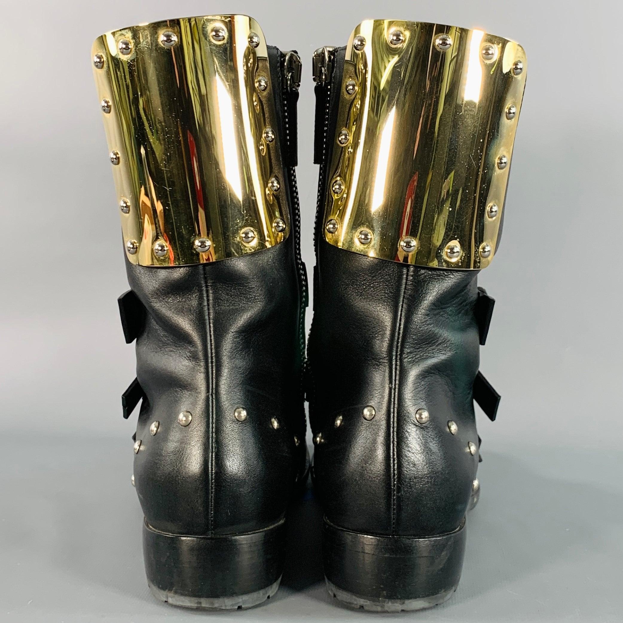 GIUSEPPE ZANOTTI Botas con cremallera y hebillas metálicas de cuero dorado negro talla 7 Negro en venta