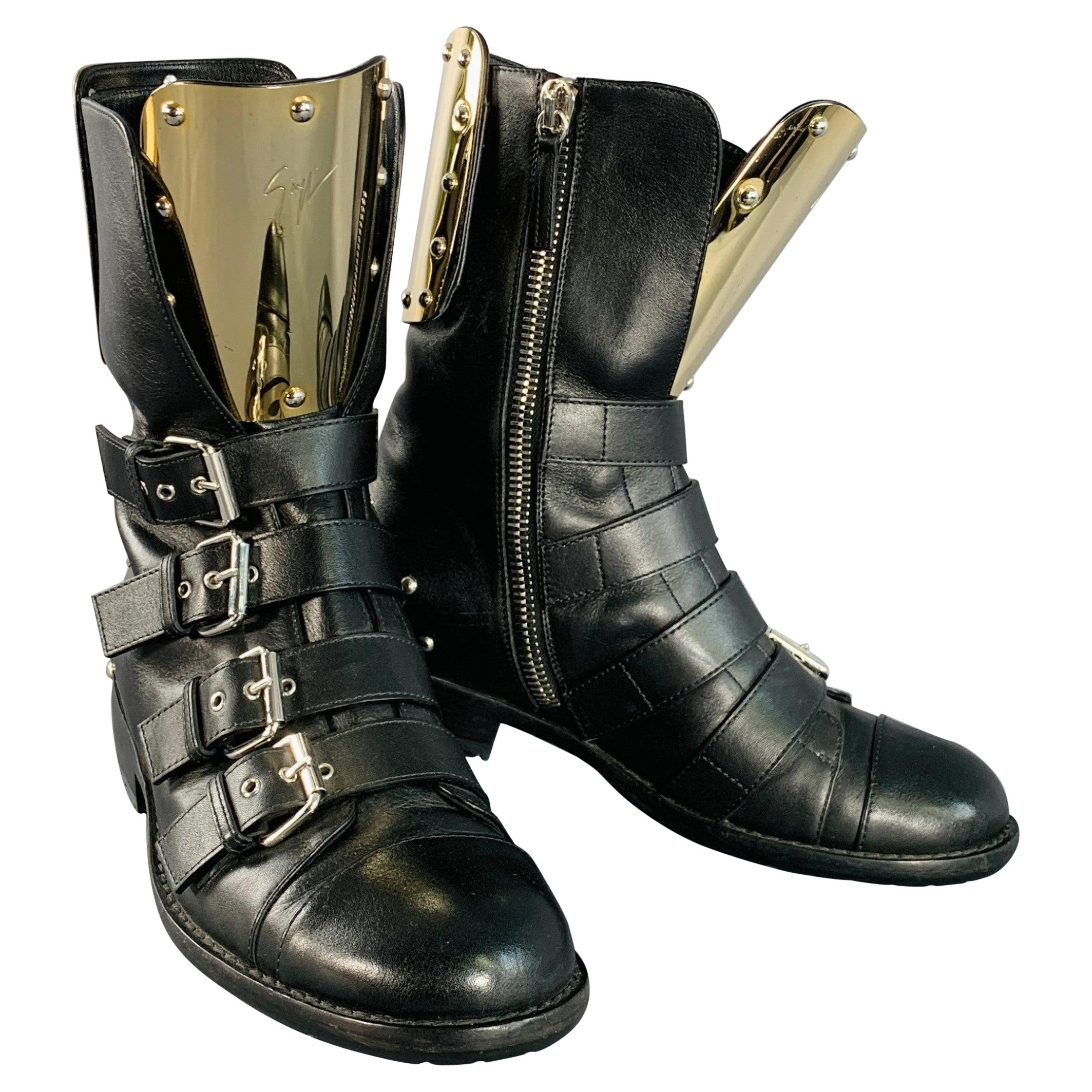 GIUSEPPE ZANOTTI Botas con cremallera y hebillas metálicas de cuero dorado negro talla 7