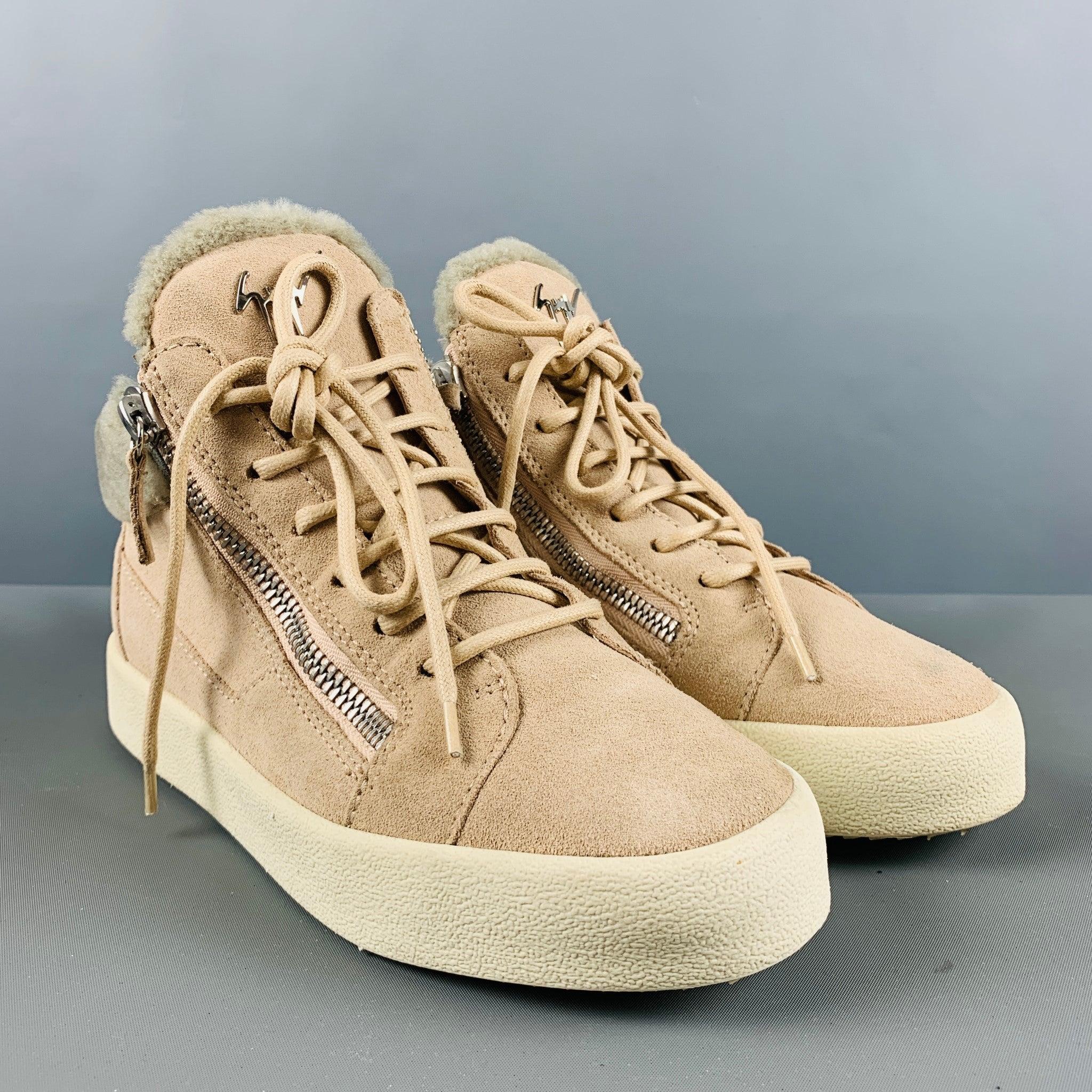 GIUSEPPE ZANOTTI sneakers comes in a grey & pink suede featuring a high top style, faux shearling, lace up, and a double side zipper closure. Made in Italy.Very Good Pre-Owned Condition. 

Marked:   39 1/2Outsole: 11 inches  x 4 inches  
  
  
